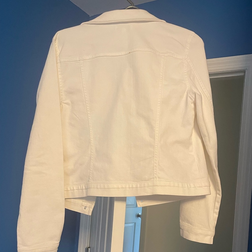 A all year round classic white denim jean jacket.